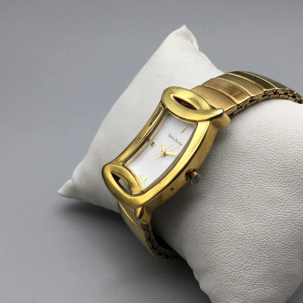 Delta Burke Womens Watch 25mm Gold Tone Asymmetrical Stretch Band New Battery